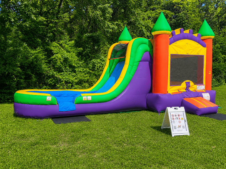 Big Bounce House Rental set up in grass for birthday event